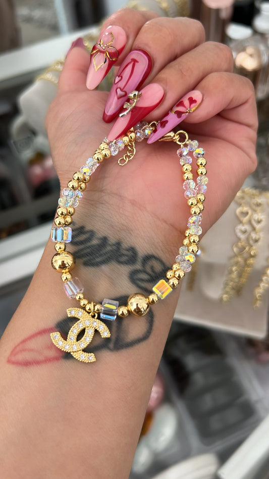 Double C gold laminated bracelet