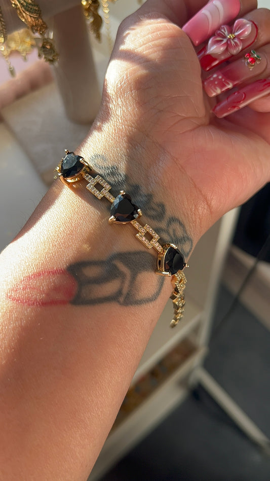Black hearts gold laminated bracelet