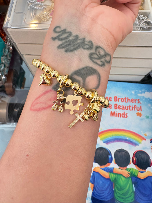 Autism boy charms stretchy gold laminated bracelet