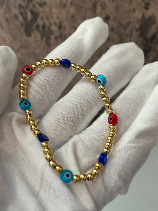 Evil eyes gold laminated bracelet