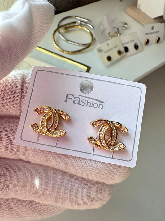 C C gold laminated earrings