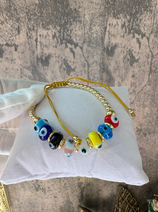 Evil eyes gold laminated bracelet