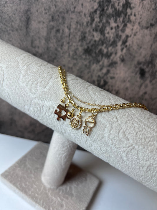 Autism Virgin Mary gold laminated bracelet
